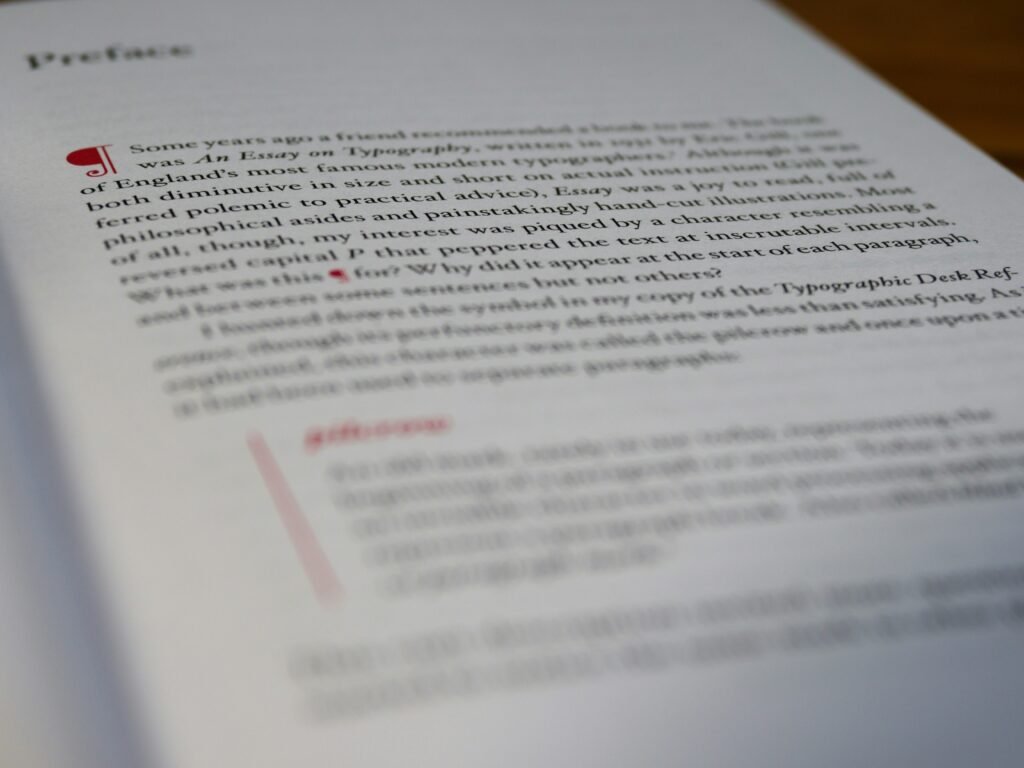 alt="human editor vs AI editing a manuscript"