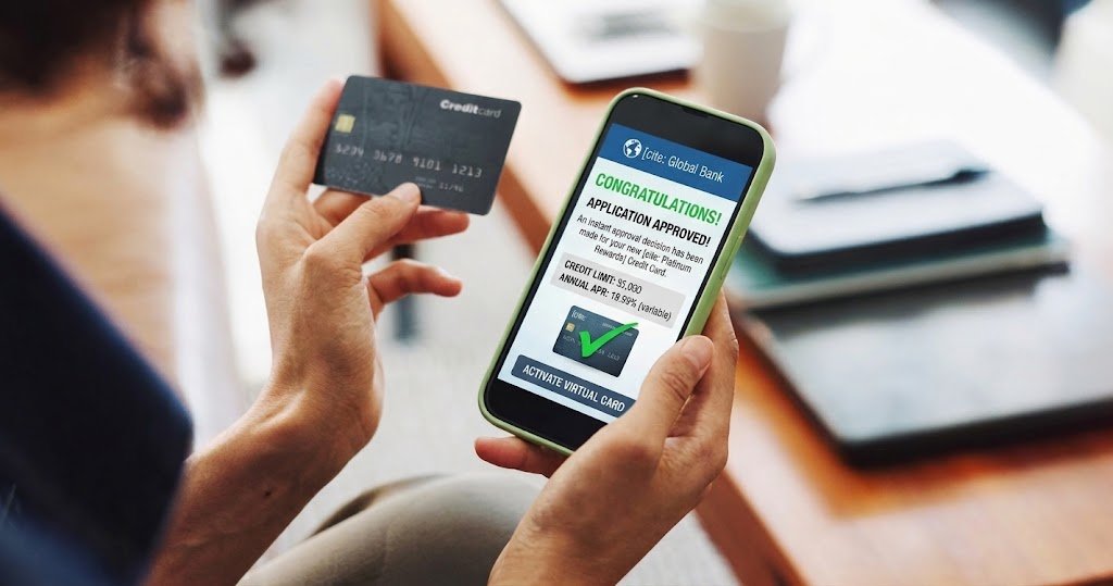 Person viewing an instant credit card approval notification on a smartphone, representing fast online credit decisions