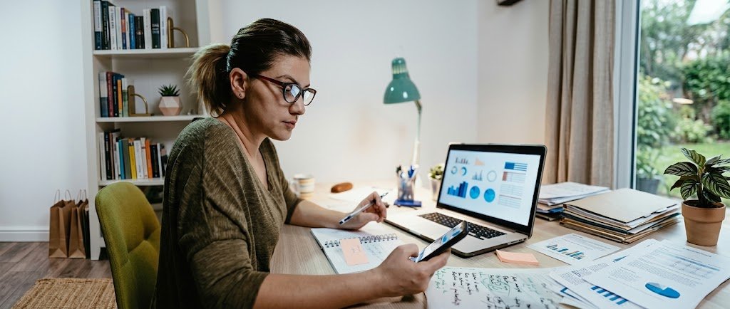 Beginner reviewing a dividend investing portfolio on a laptop