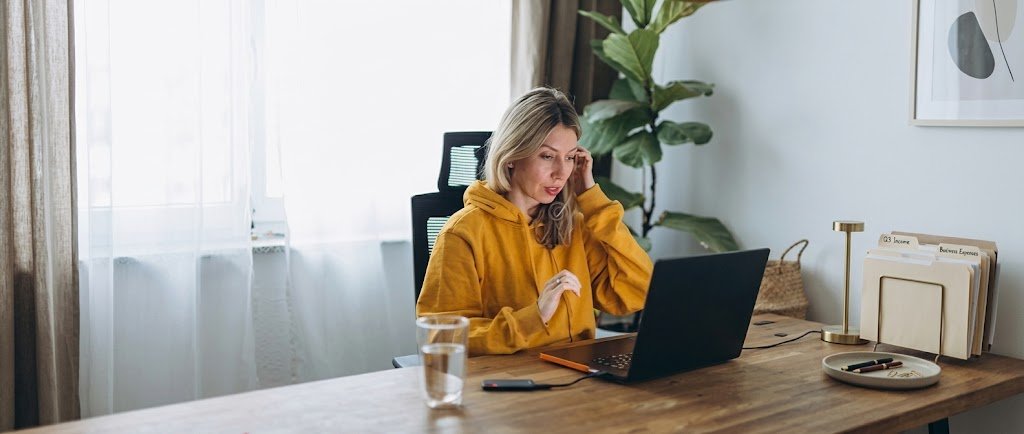 Freelancer reviewing paperwork for loans for gig workers without a salary slip